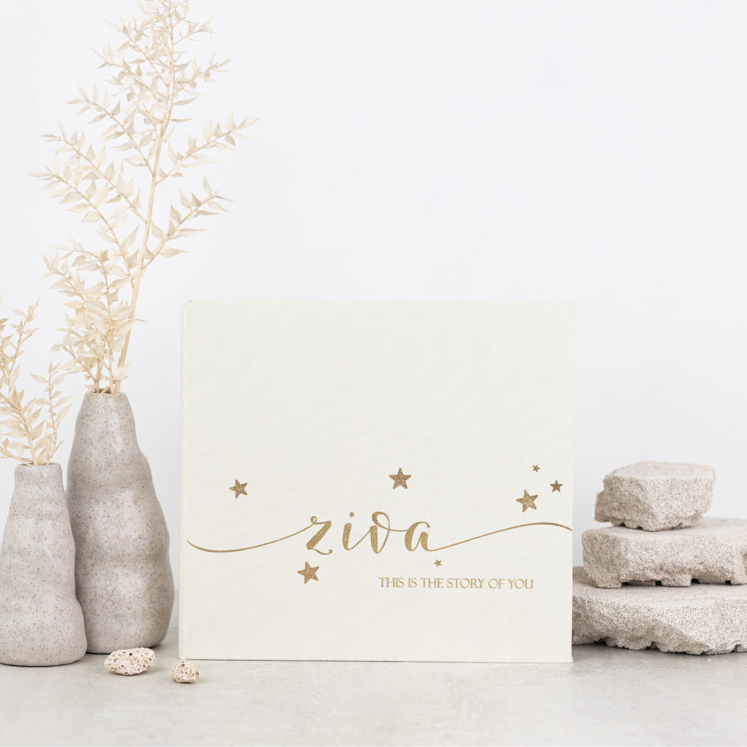 STARS Minimalist baby memory book with fabric cover and customizable details.