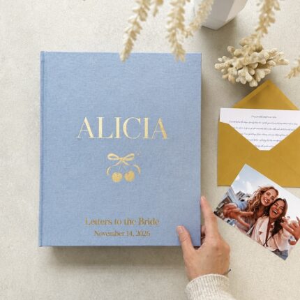 Baby blue scrapbook binder with elegant foil gold lettering, personalized Letters to the Bride book with envelopes.