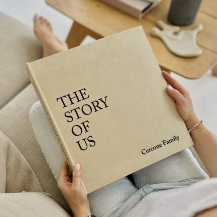 Custom handmade beige photo album with glassine interleaves, designed to hold 4×6, 5×7, and 8×10 inch photos. Elegant cover design and timeless handmade style.